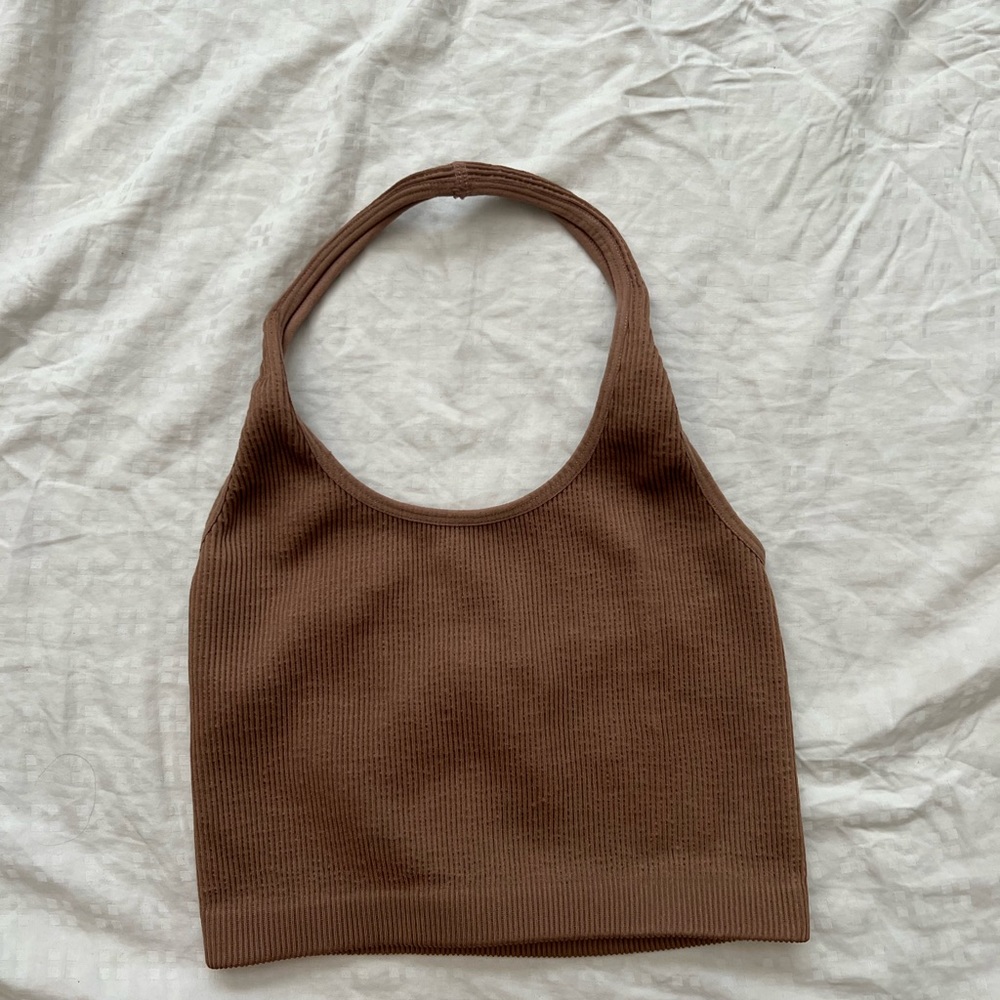 Tan crop top no sleeves ( goes around the neck)